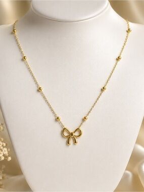 Carrie Bow Gold Pendant Necklace